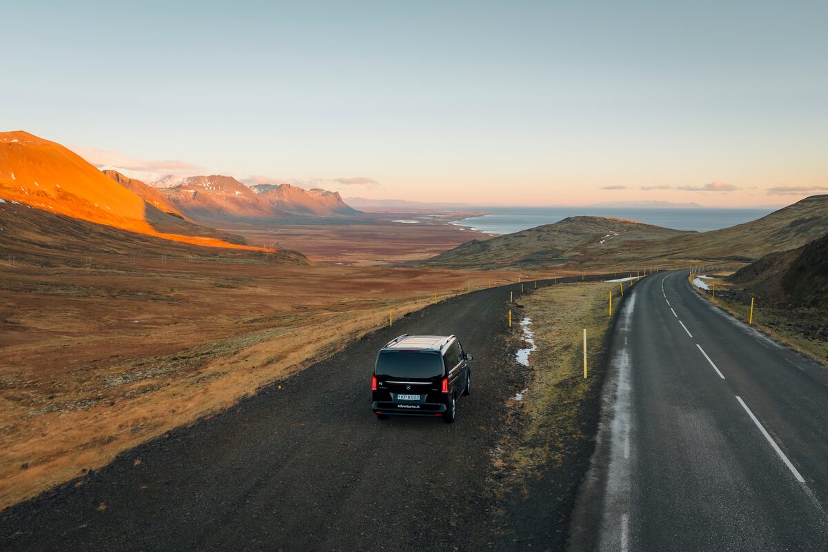 A Car On The Road To Snaefellsnes Peninsula in iceland