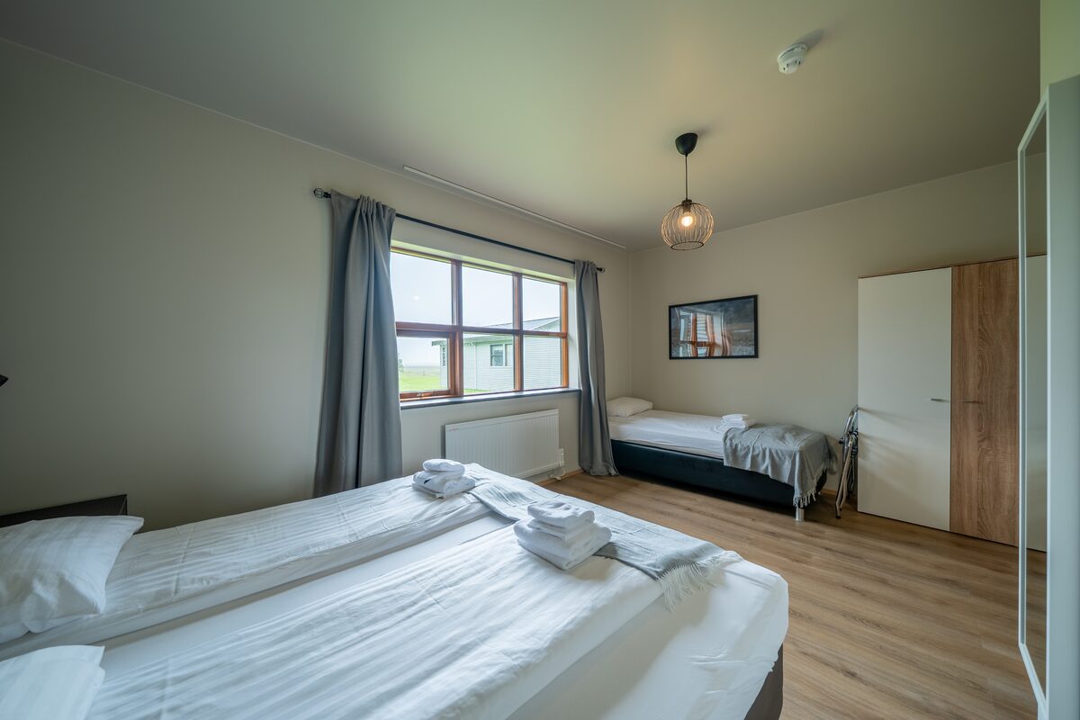 Double Bed Plus Single Bed Room At Hotel Geirland in iceland