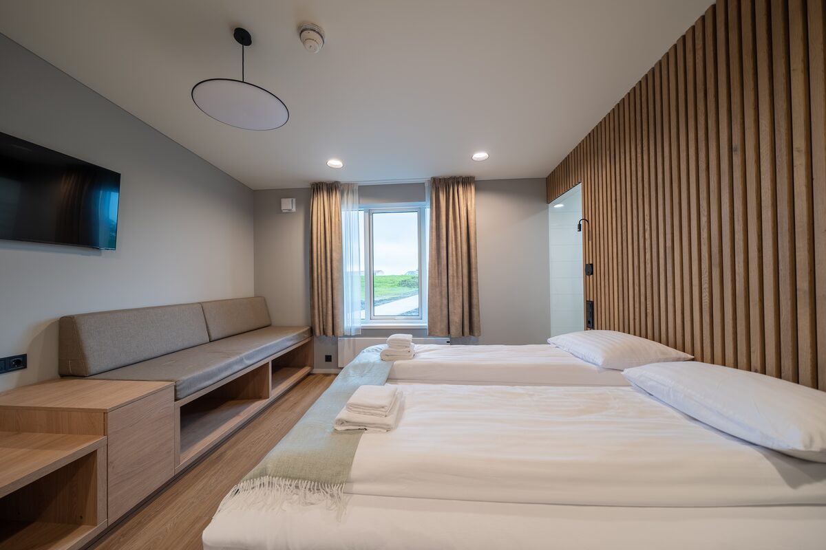 Double Bed Room With A Sofa At Hotel Geirland in iceland