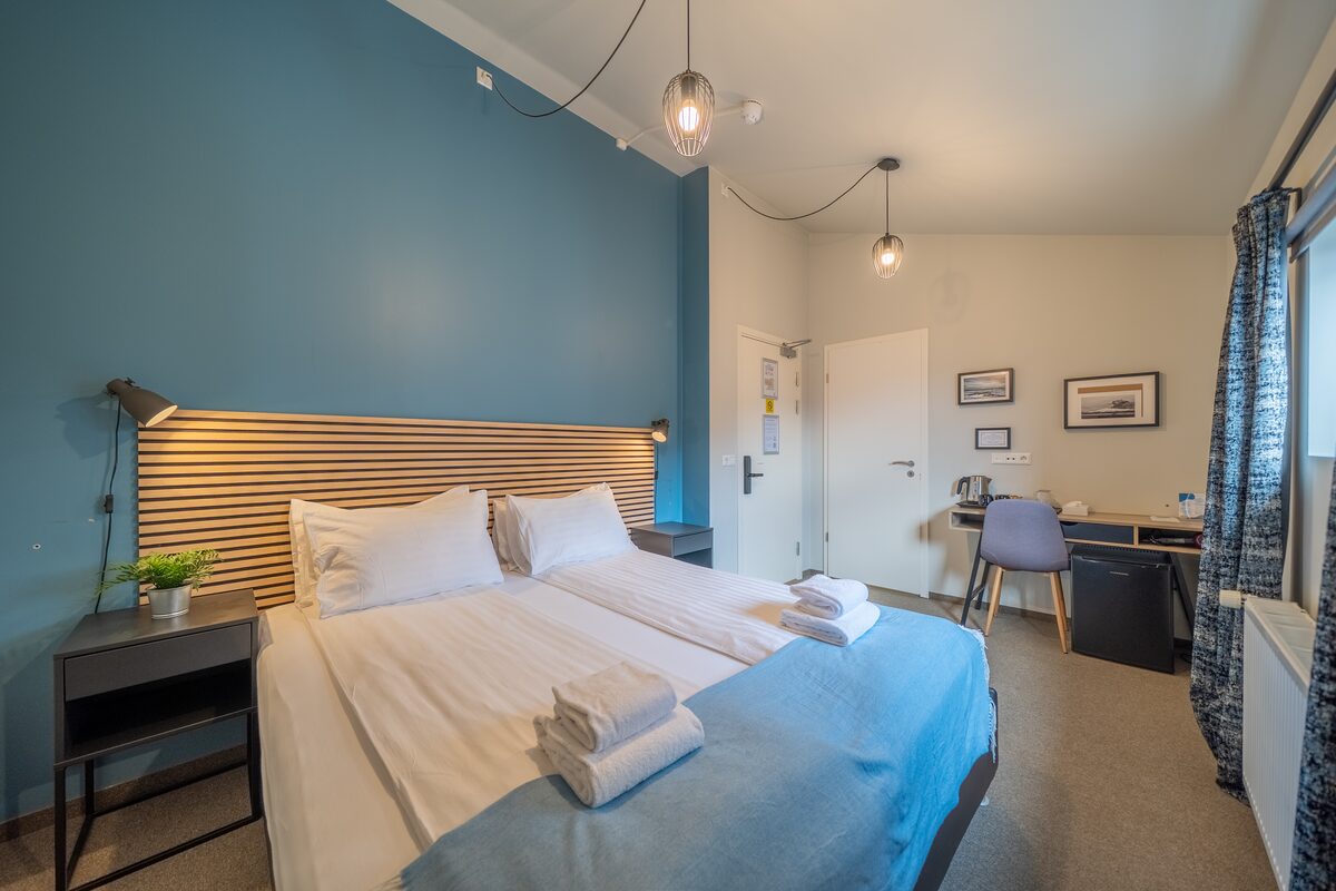 Double Bed Blue Wall Room At Hotel Hof in iceland
