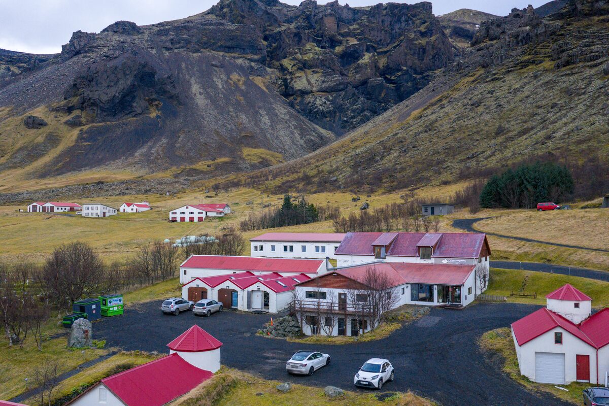 Main Buinding Of Hotel Hof In Front Of A Mountain in iceland