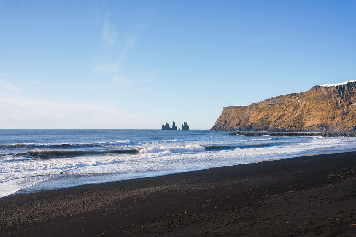 Rock Formations In Water At A Beach In Iceland