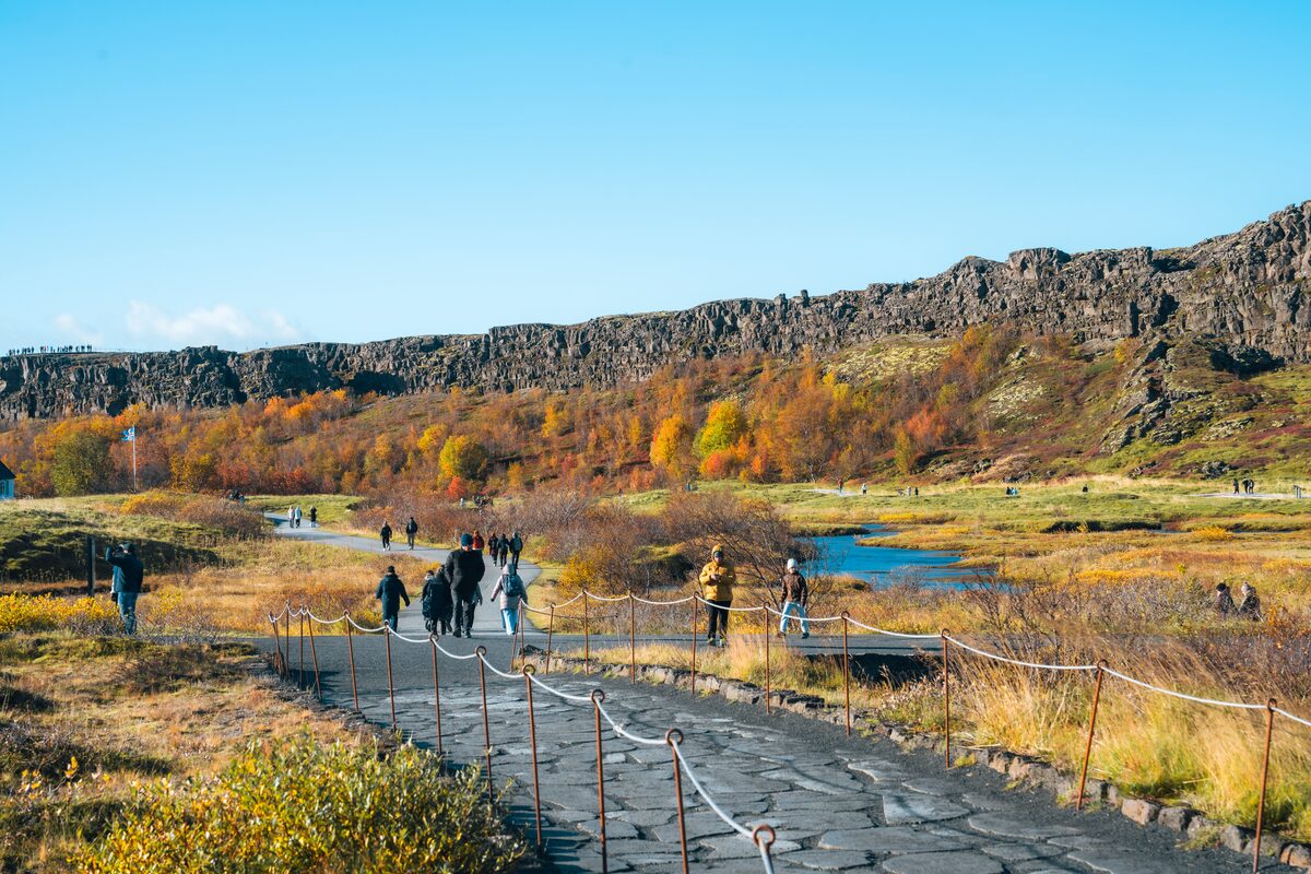 Tourists Walking Around At Thingvellir Park in iceland