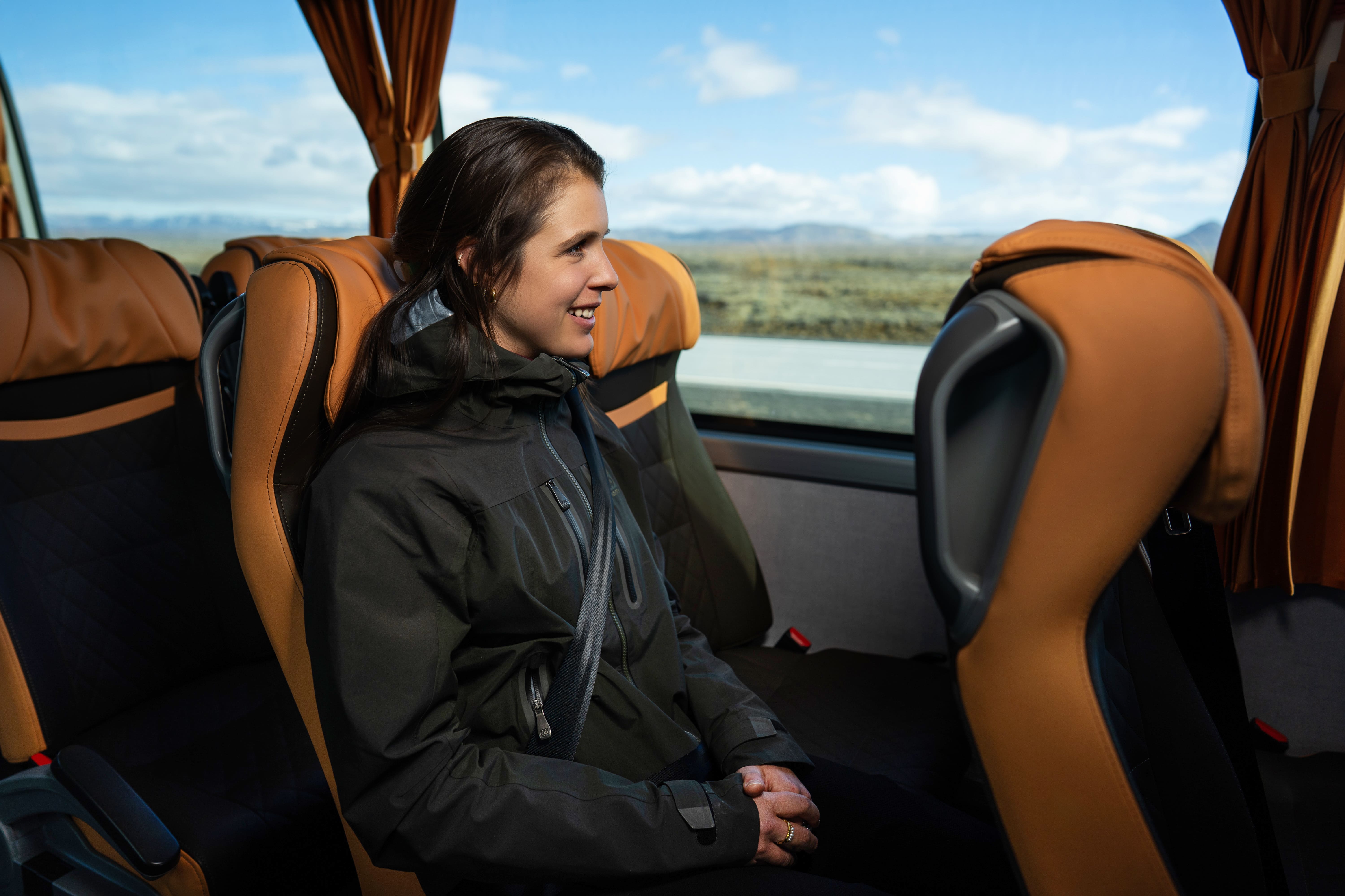 Woman Sitting Inside Of A Flybus Bus in Iceland