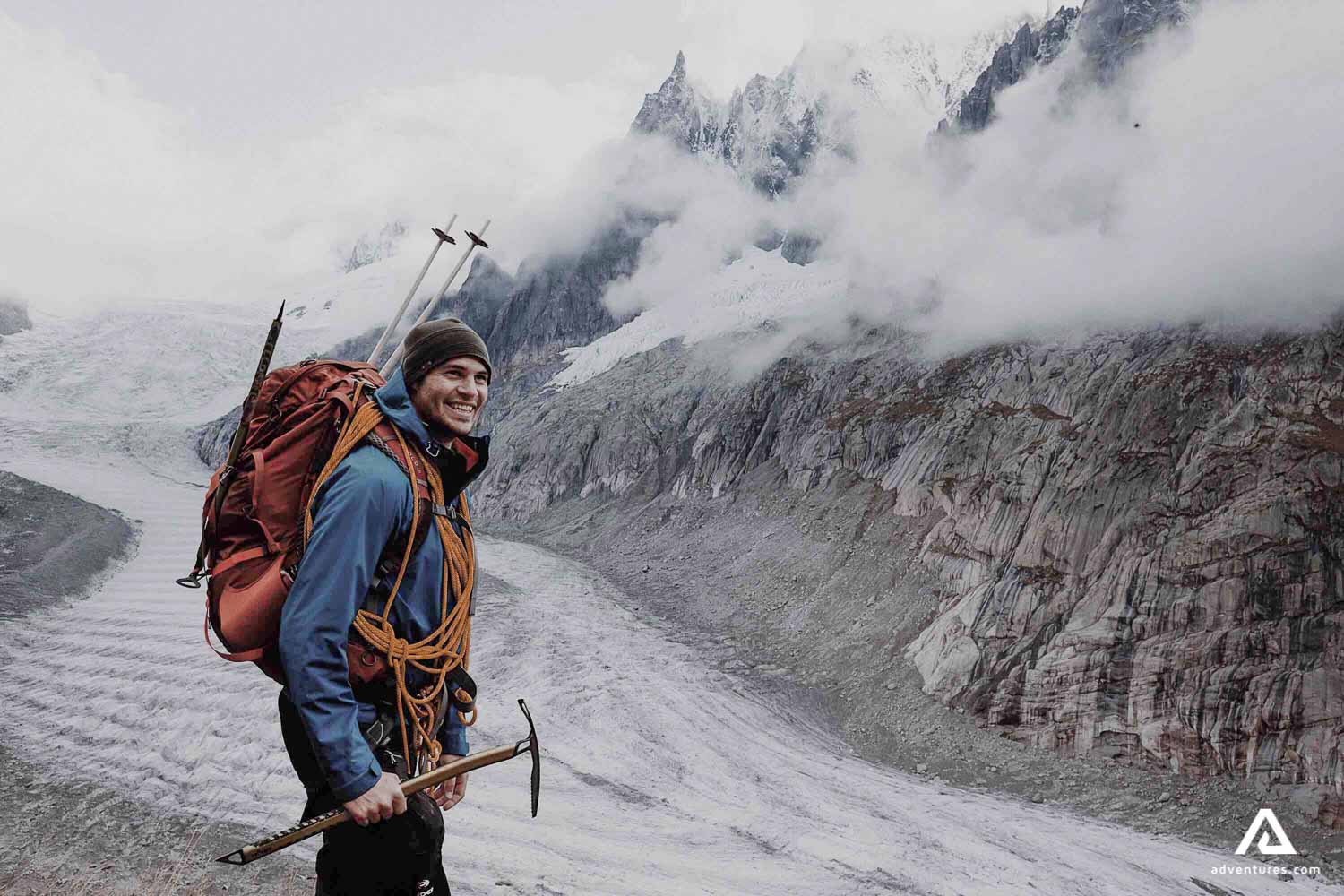 Happy man on backpacking tour
