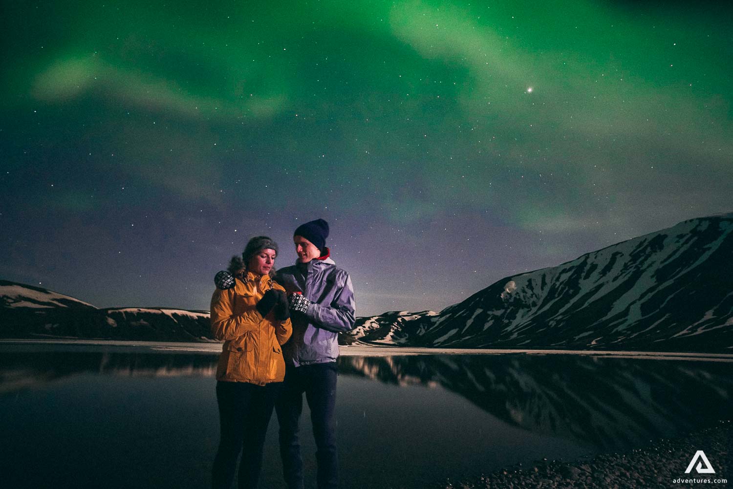 Romantic couple Aurora Borealis