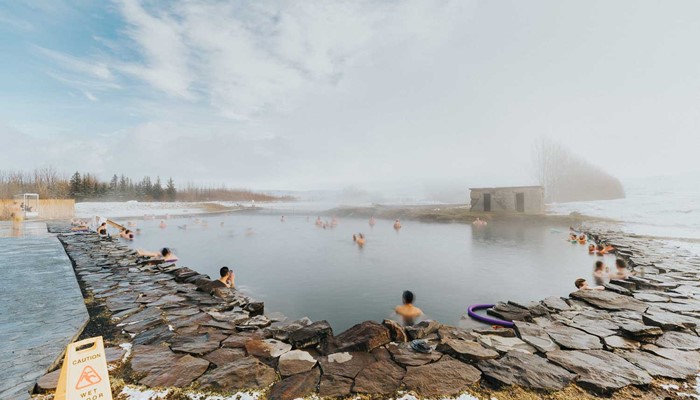 People Enjoy Iceland's Thermal Baths