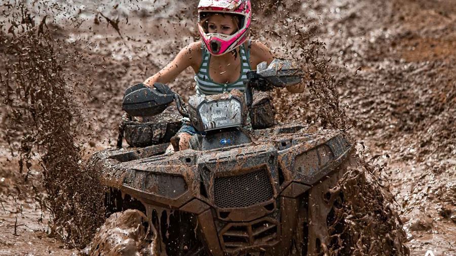 Extreme mud quad bike riding