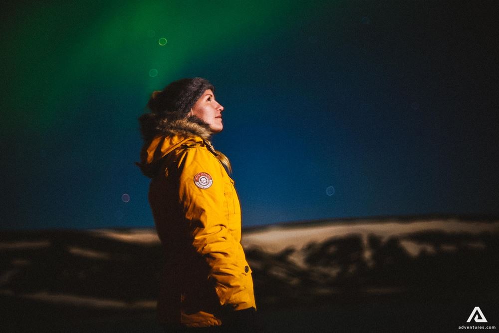 Woman exploring Northern Lights
