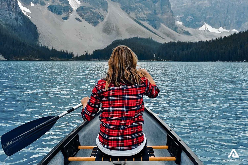 Checked shirts woman canoeing