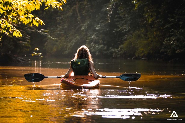 Woman kayaking in the river