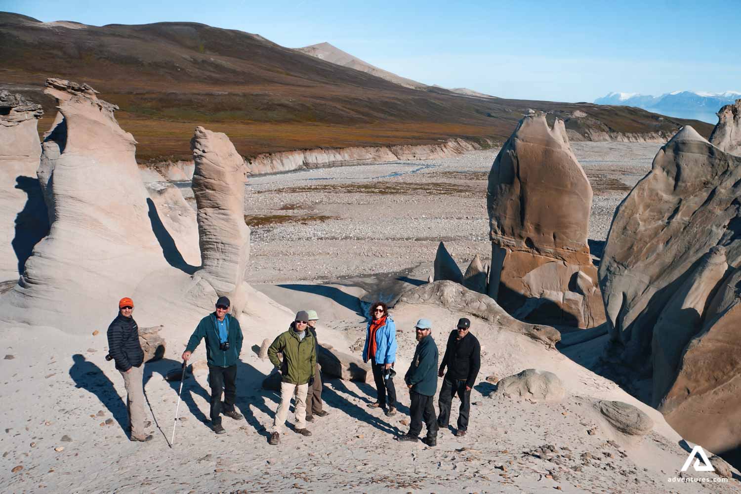 Tourists around stone pillars