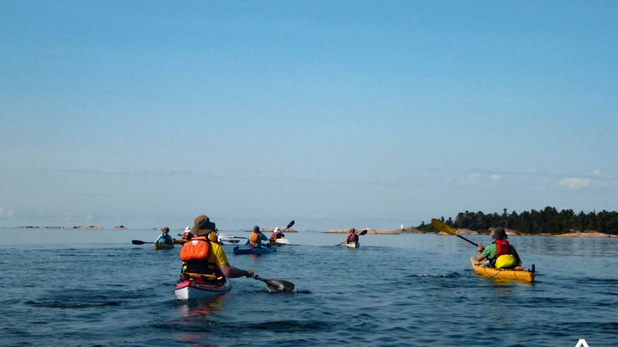 People Kayaking In The Ocean in Canada