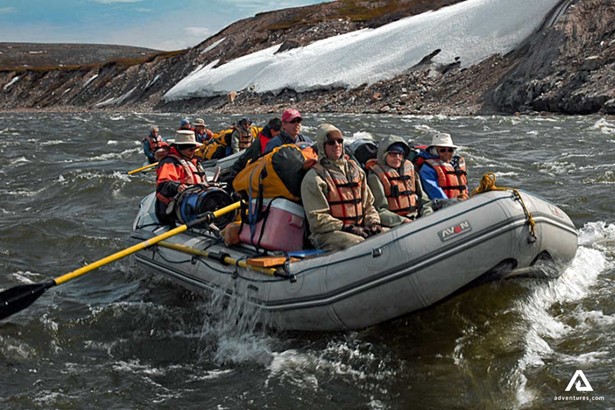 large group in a raft in nunavut on burnside river