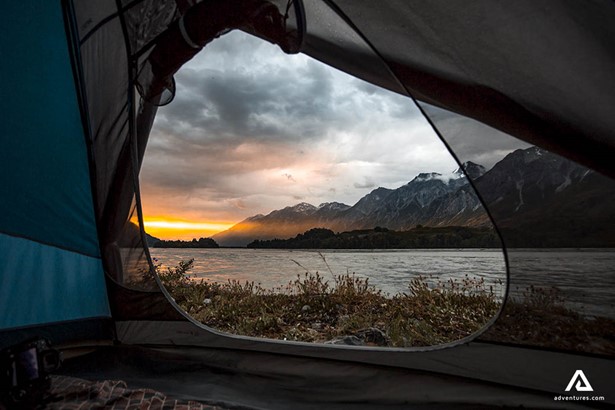 view through a tent at sunset