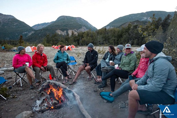 group of people near a campfire in canada