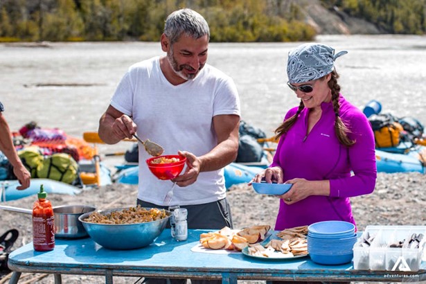 cooking on the shore of Tatshenshini River in canada
