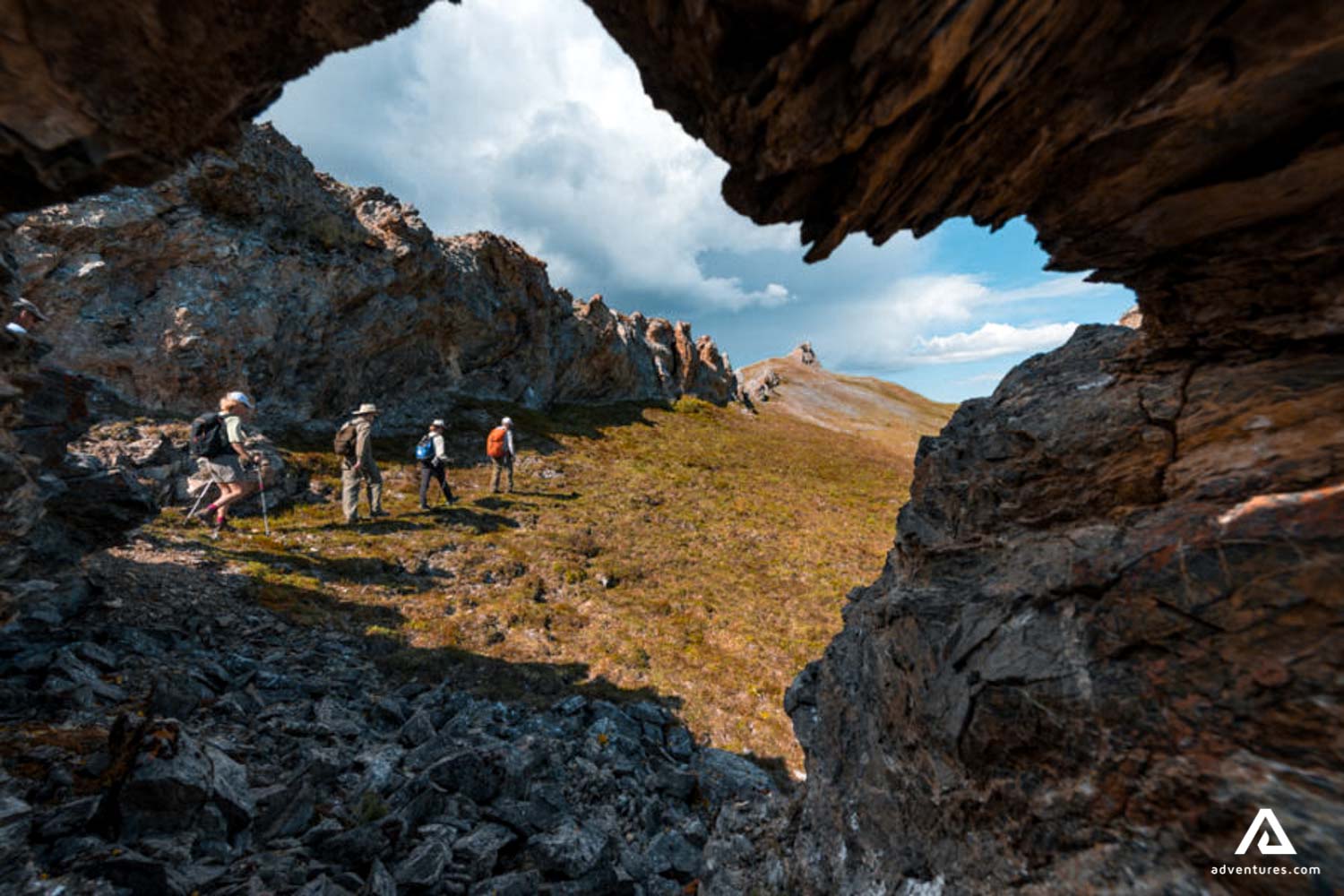 group hiking near canyons and mountains