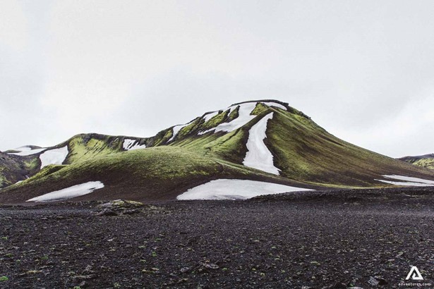 green volcanic mountain view in iceland