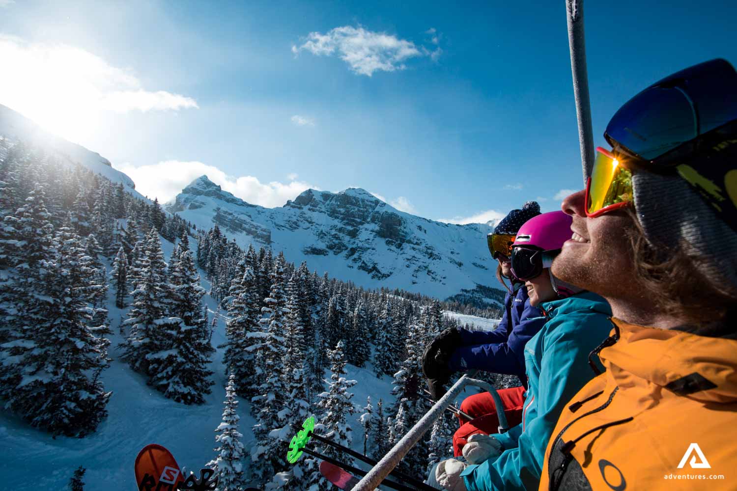 Happy people on a ski lift