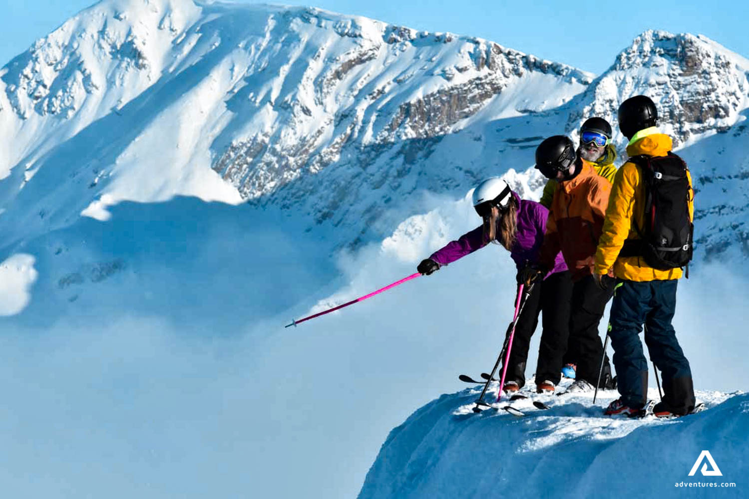 skiiers in high mountains in canada