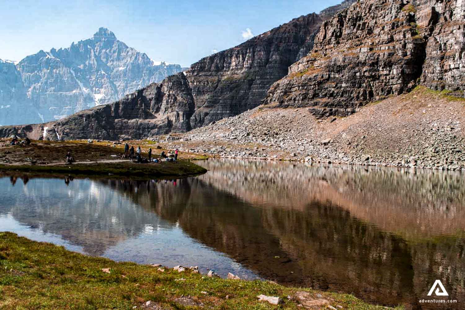 lake reflection on a small lake in the mountains in canada