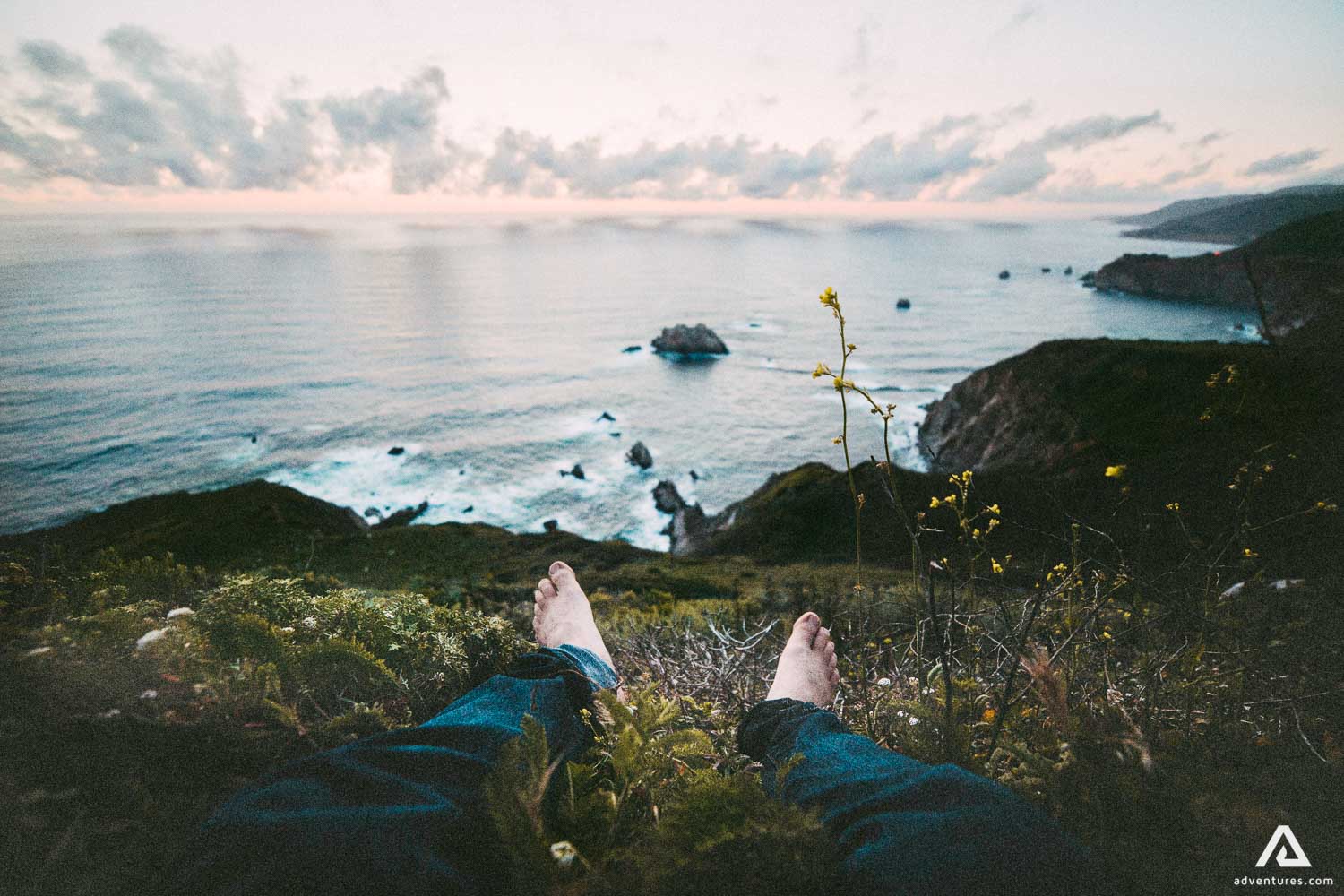 Feet Of A Man Near The Sea