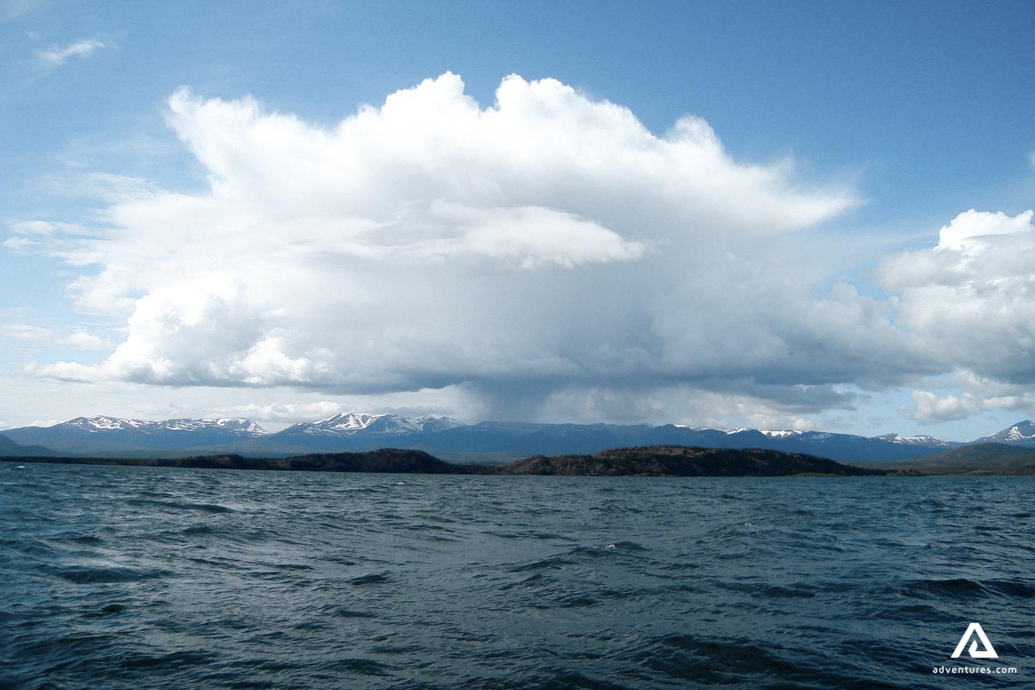 large cloud above yukon river in canada