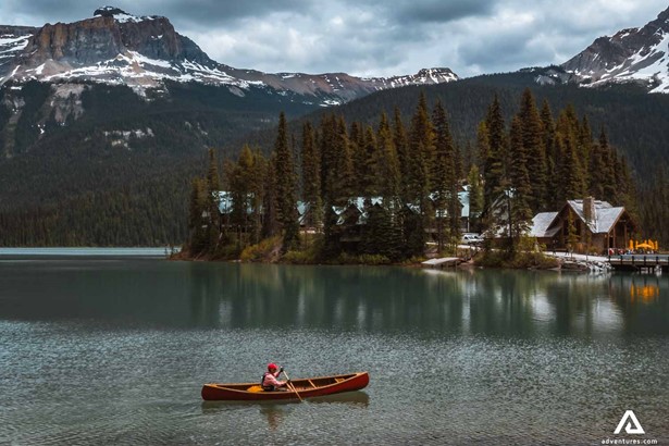 Man canoeing on the lake in Canada