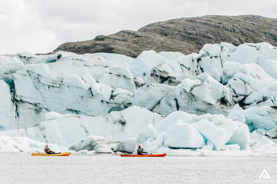 kayaking next to a glacier