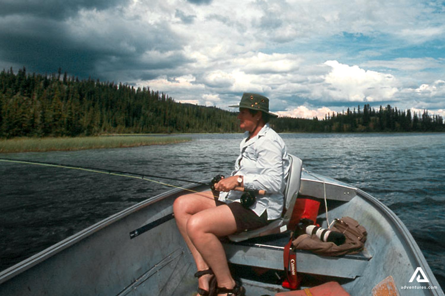 fishing out of a small boat in yukon canada