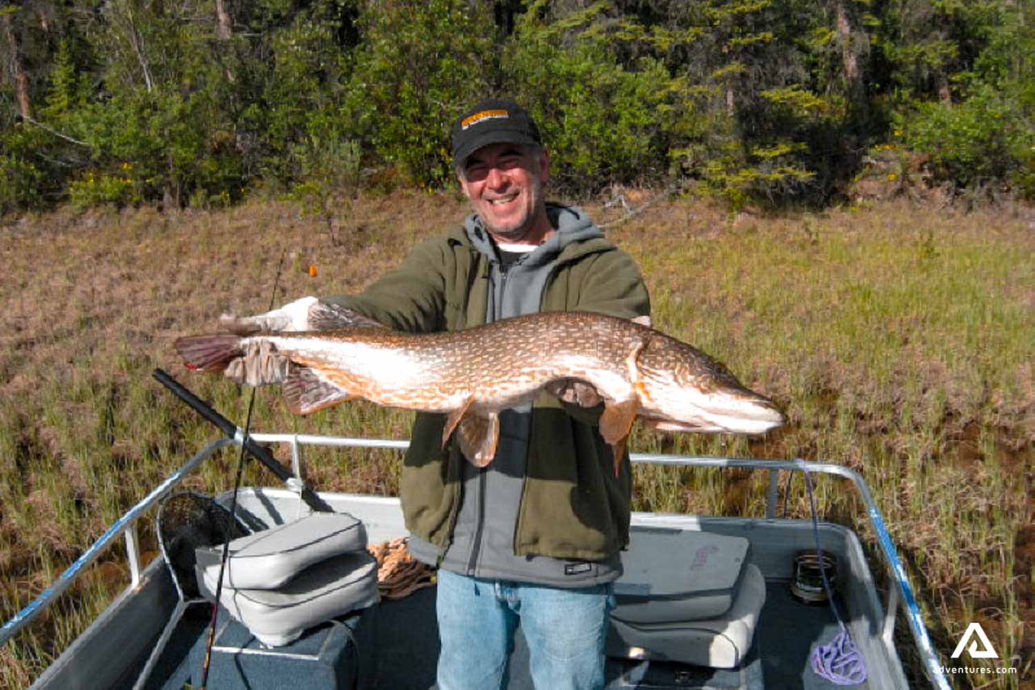 large fish caught on a boat in yukon