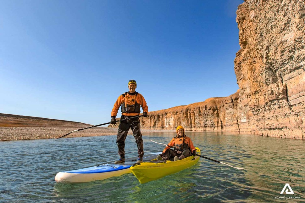 two people on paddle boards in somerset island