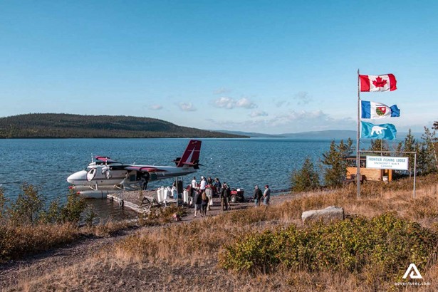 boarding a plane near great slave lake in canada