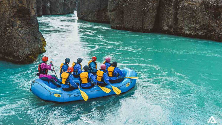 People Are Rafting On River Hvita Gullfoss In Iceland