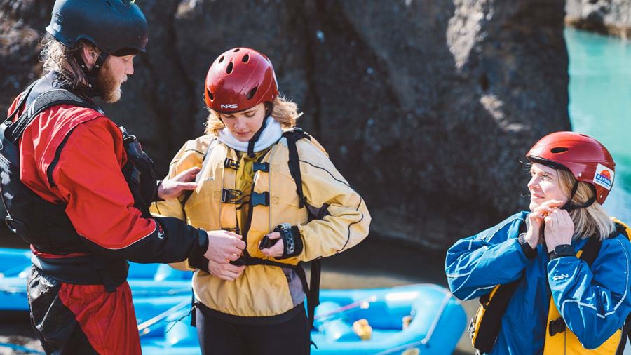 Three People Are Preparing For Rafting In Iceland