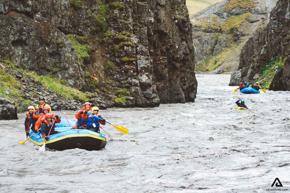 Two Boats And Kayak Rafting Glacial River in Iceland