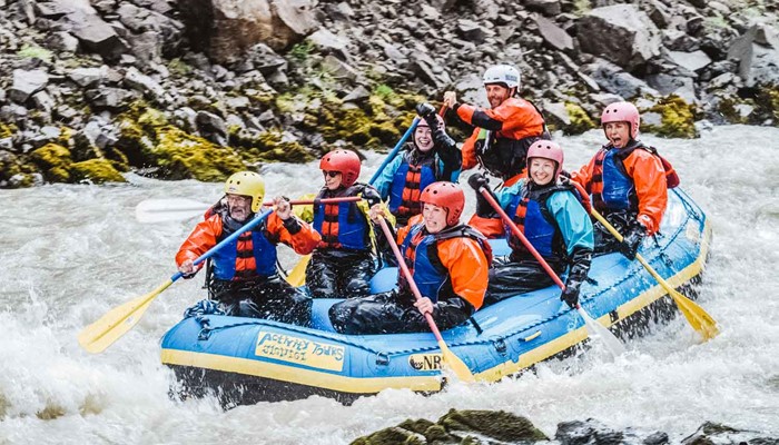 People Rafting Down Glacier River In Iceland