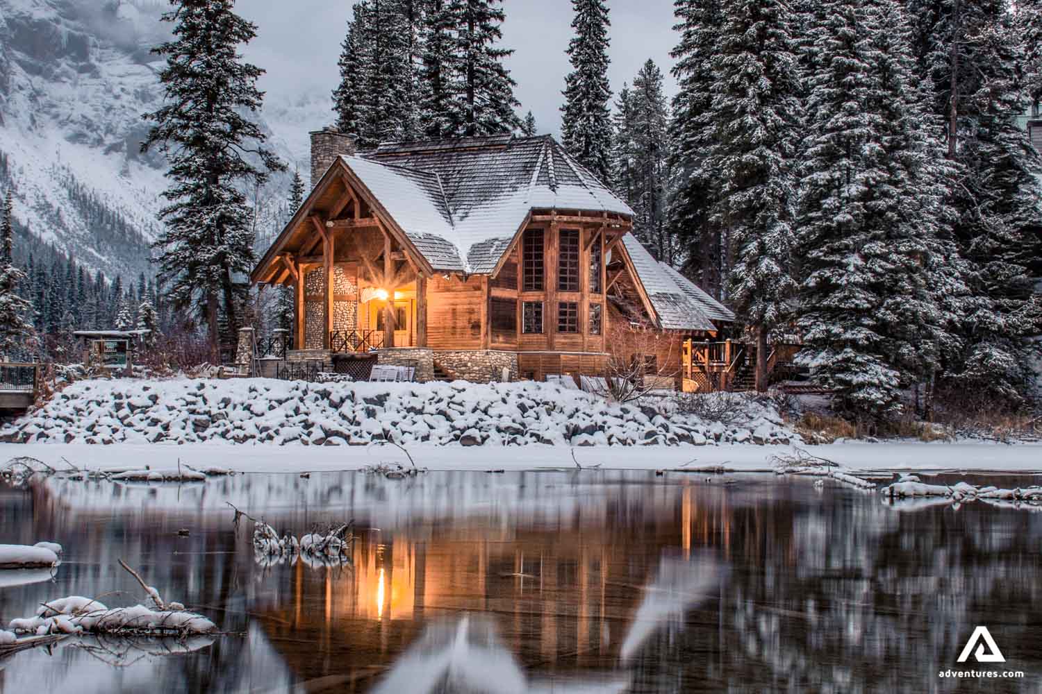 log cabin house in canada in winter