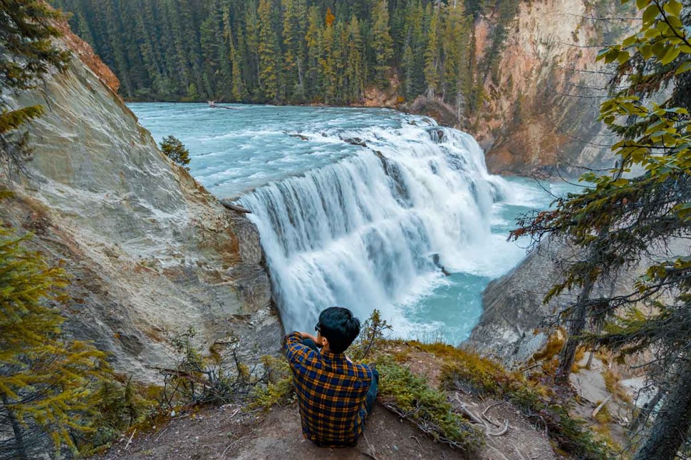 man sitting in yoho national park in canada