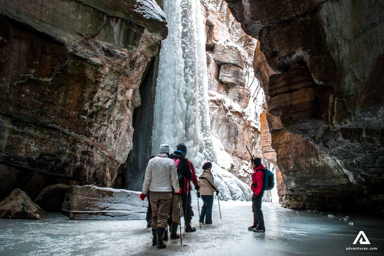 walking with a guide near maligne canyon in canada