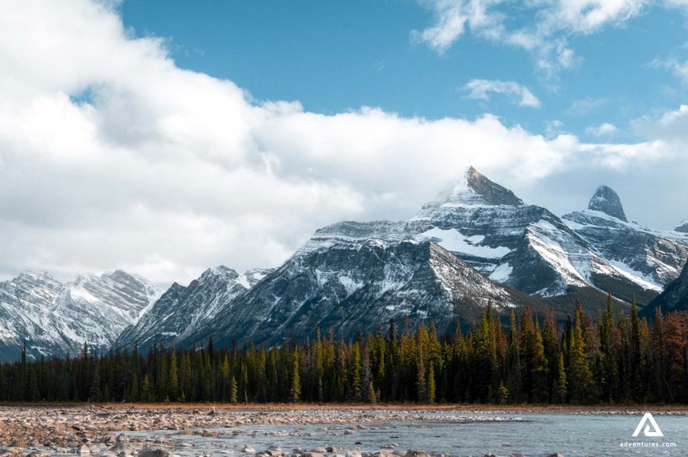 mountain peaks near athabasca river in canada at winter