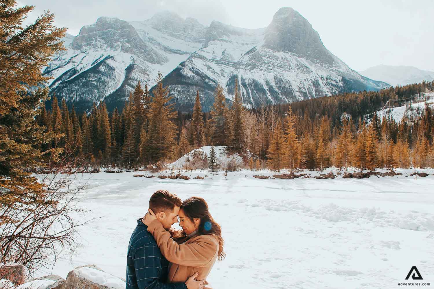 couple posing for a picture in canada canmore area