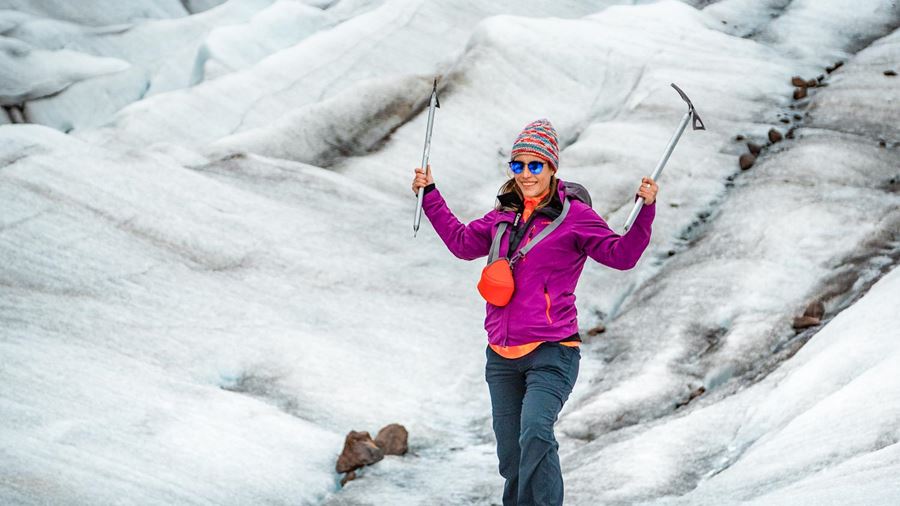 happy woman with ice axes
