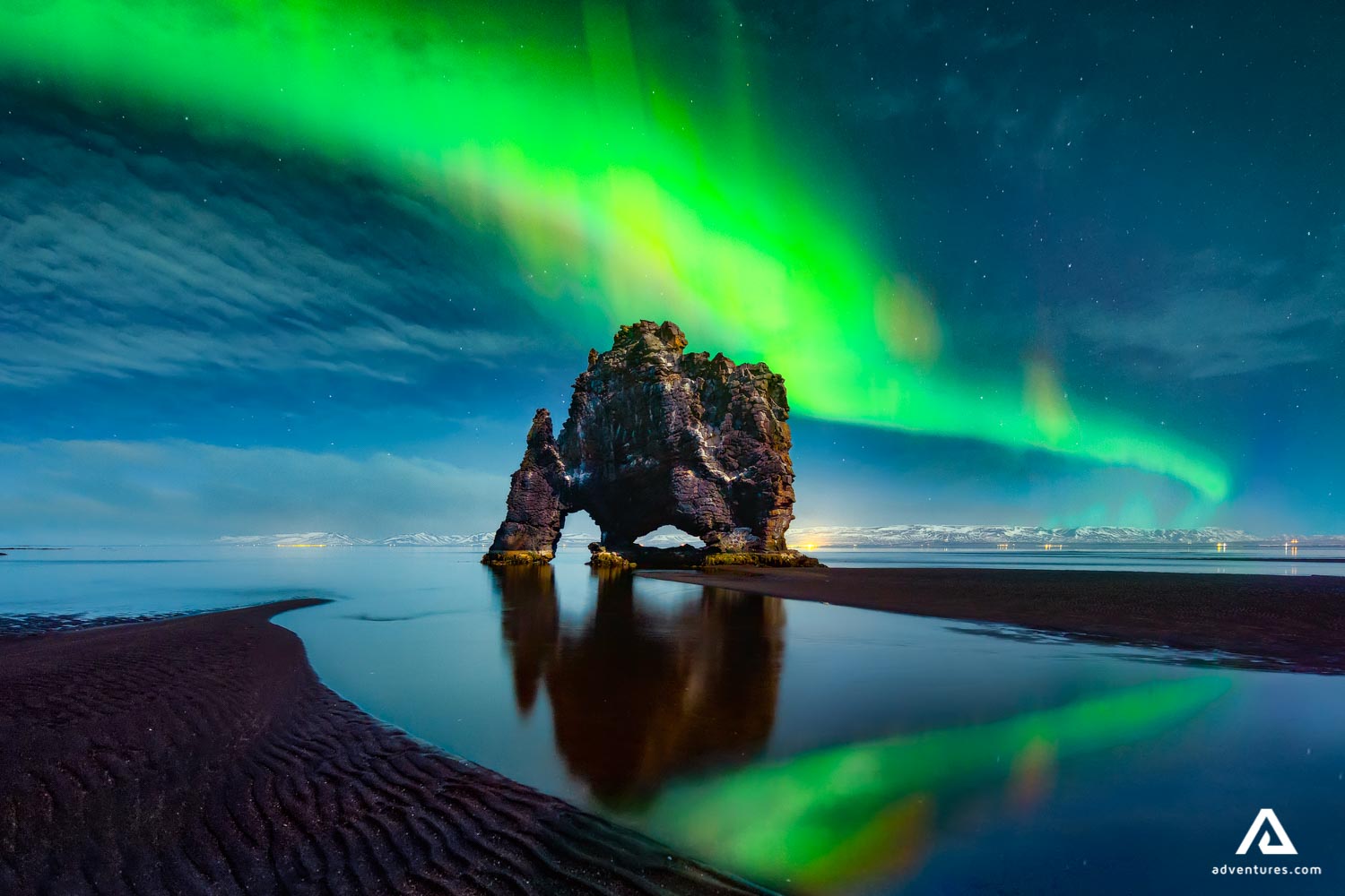 hvitserkur rock formation with northern lights above it