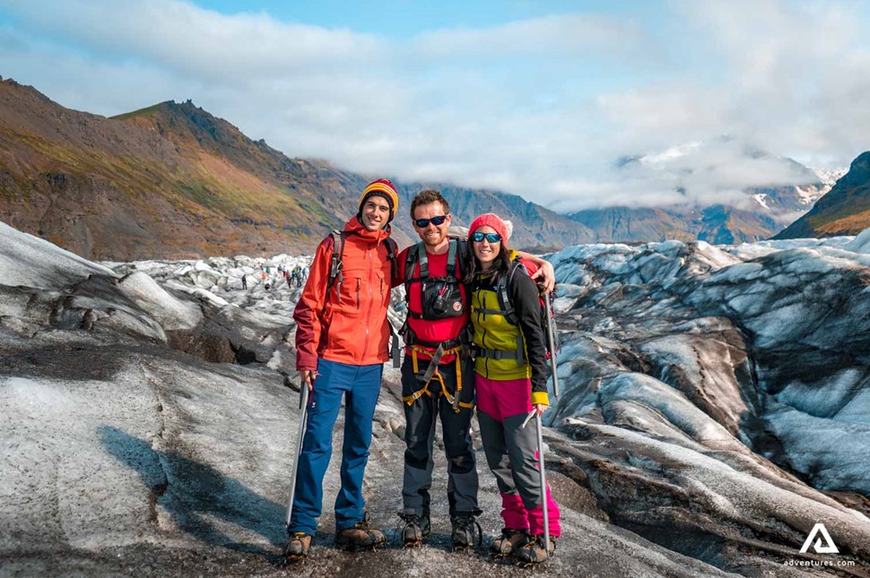 posing for a picture on svinafellsjokull glacier