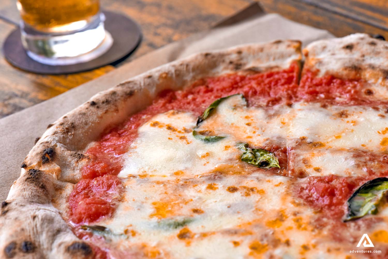 cheese pizza on a wooden table in reykjavik
