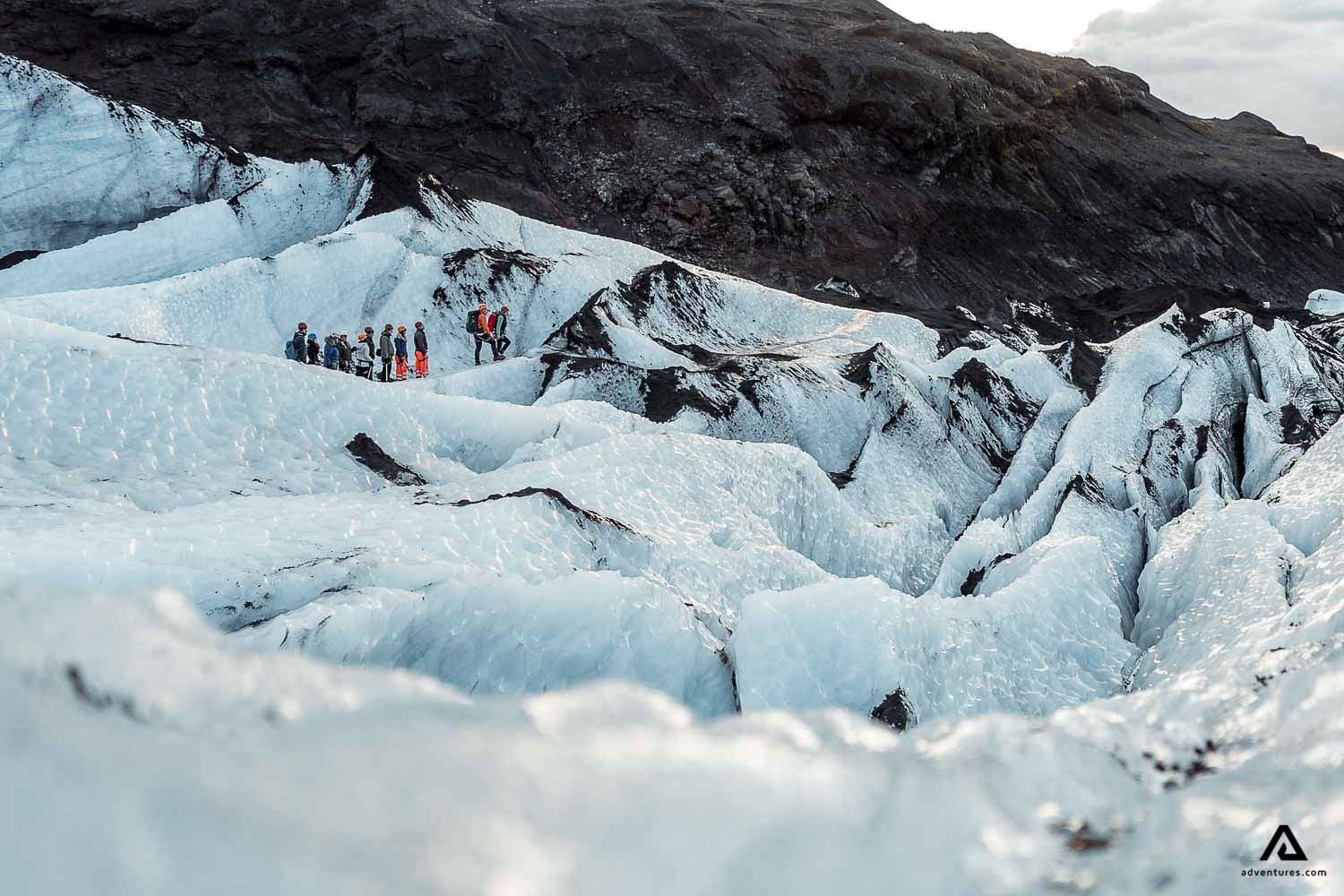 Group Of People Hiking On Solheimajokull Glacier