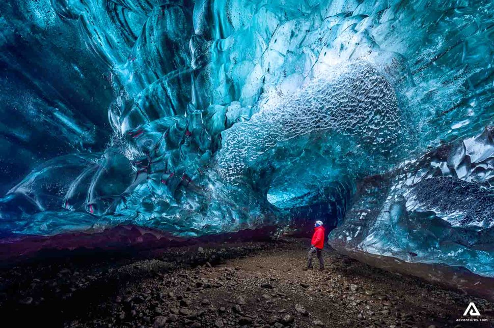 Man Standing In Ice Cave Vatnajokull