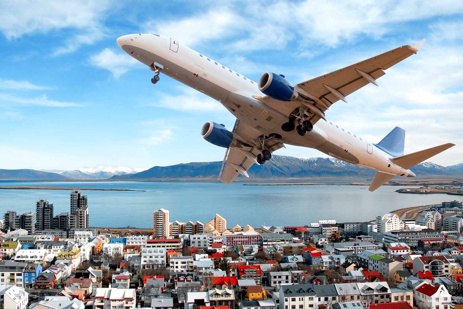 Plane Flying Above Reykjavik In Iceland